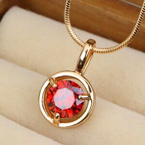 "Elegant Round Red Crystal Pendant in Gold Plated Brass, XPPT1702